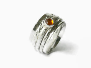 Spinner, or anxiety ring, sterling silver with amber, by Watch Me World, Etsy, $99