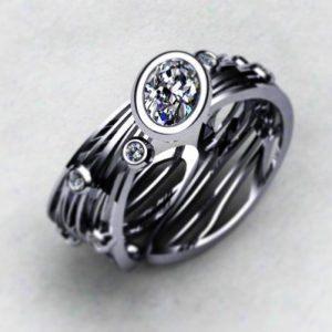 Dragonfly wings ring in palladium and real Pure Grown synthetic diamonds.