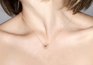 morganite and diamond halo necklace in rose gold