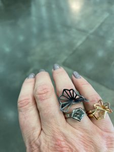 prasiolite and oregon sunstone rings with origami accents by karin jacobson
